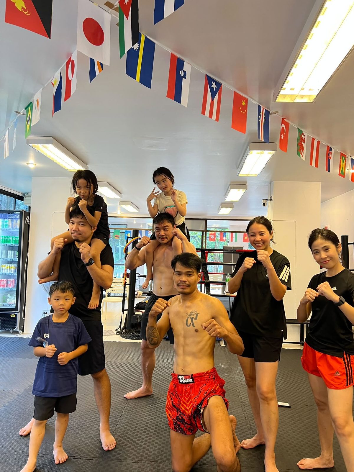 Kids and adults training together in a Muay Thai class in Chiang Mai
